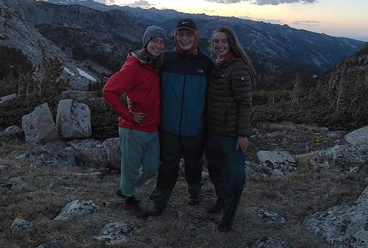 David Buckner, center, with fellow UNC Charlotte students Natalie Bates, left, and Karsyn Koon, during a hiking trip for members of the Levine Scholars Program in 2020.
