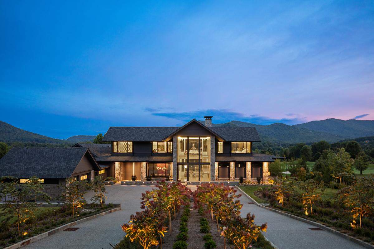 214 Folkstone Ln. overlooks the Jack Nicklaus Signature Golf Course with a backdrop of the Blue Ridge Mountains.