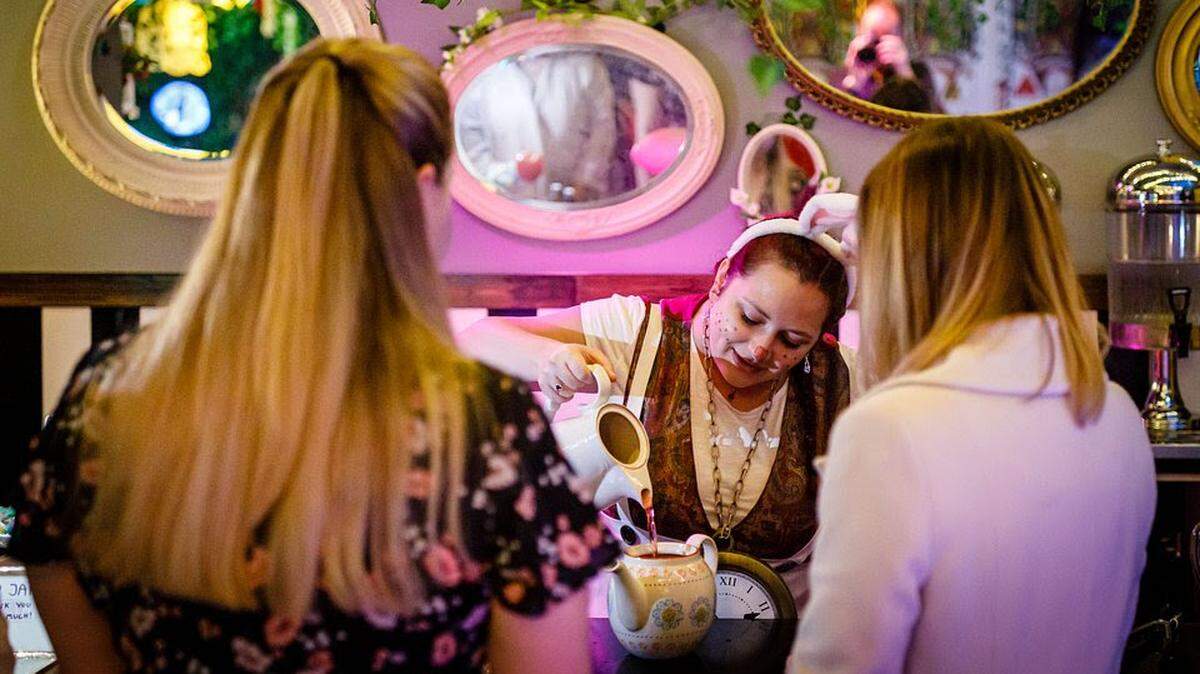 The Alice: An Immersive Cocktail Experience features staff dressed in character to bring the world of “Alice in Wonderland” to life.