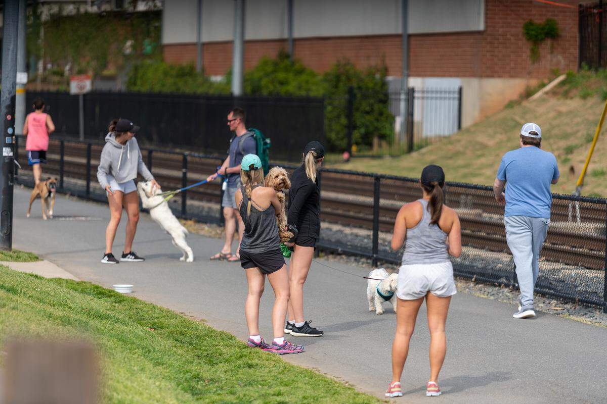 Visitors to the Rail Trail in South End on April 11, 2020.