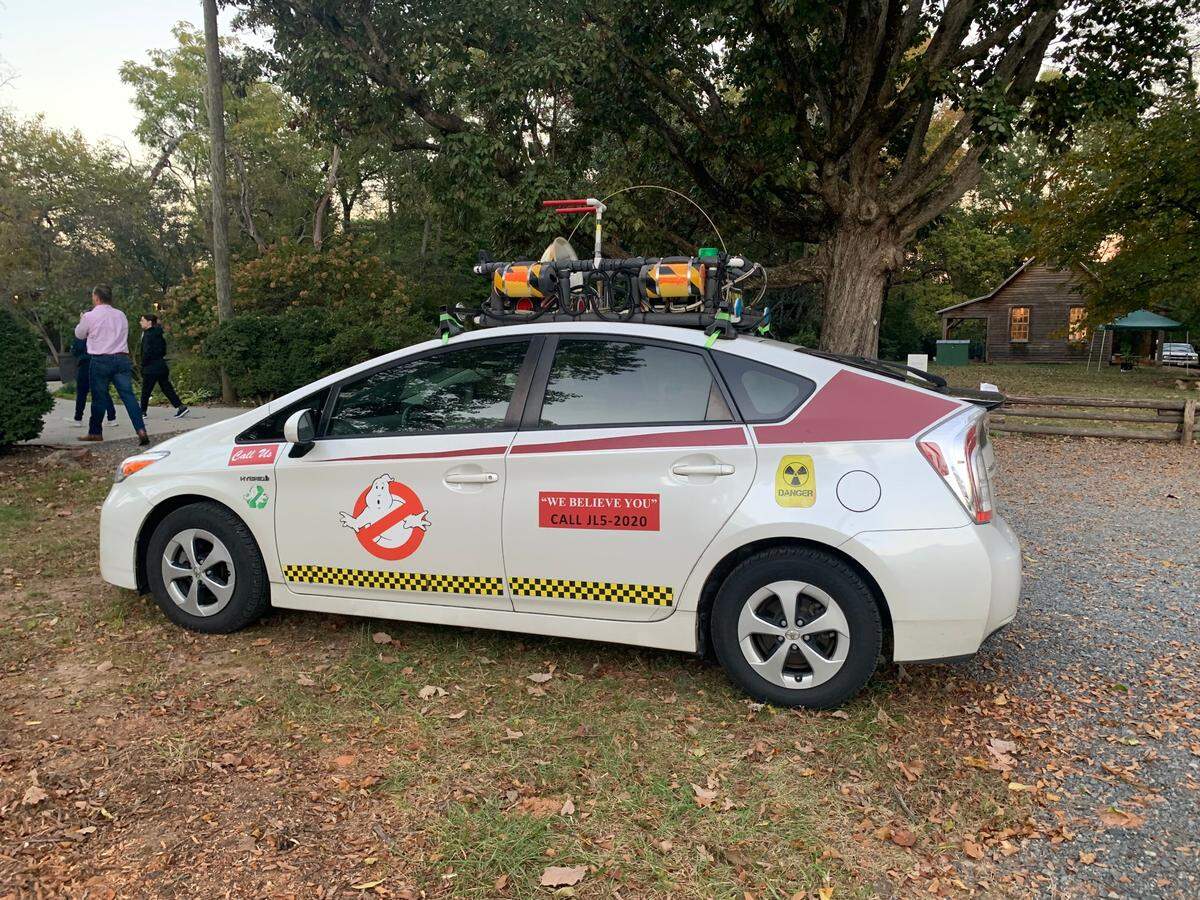 The Charlotte Areas Paranormal Society ghost hunting car sits outside Historic Rosedale as they prepare for a paranormal investigation.