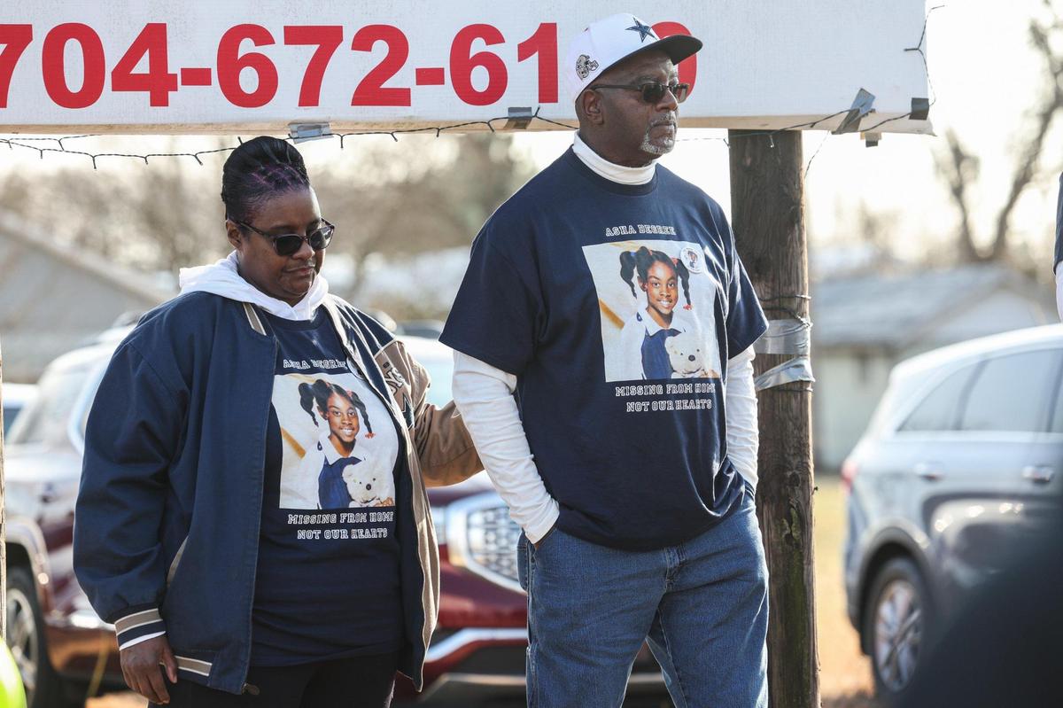 Iquilla Degree, places a hand on her husband Harold’s back as their son, O’Bryant, makes a heartfelt apology to his father for hurtful remarks made by people since the disappearance of their daughter, Asha, since February 2000.