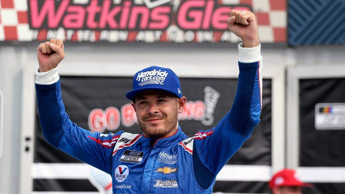 Kyle Larson celebrates winning a NASCAR Cup Series auto race in Watkins Glen, N.Y., on Sunday, Aug. 8, 2021. (AP Photo/Joshua Bessex)