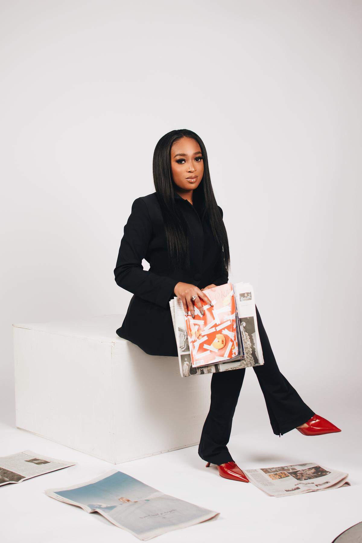 TikTok creator Kelsey Russell is known for reading print newspapers and talking about them on social media.