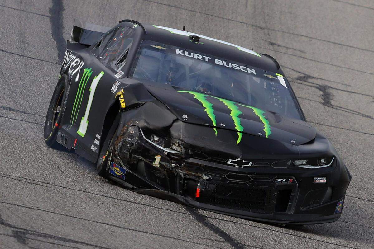 HAMPTON, GEORGIA - MARCH 21: Kurt Busch, driver of the #1 Monster Energy Chevrolet, drives a damaged car off the track after an on-track incident during the NASCAR Cup Series Folds of Honor QuikTrip 500 at Atlanta Motor Speedway on March 21, 2021 in Hampton, Georgia. (Photo by Kevin C. Cox/Getty Images)