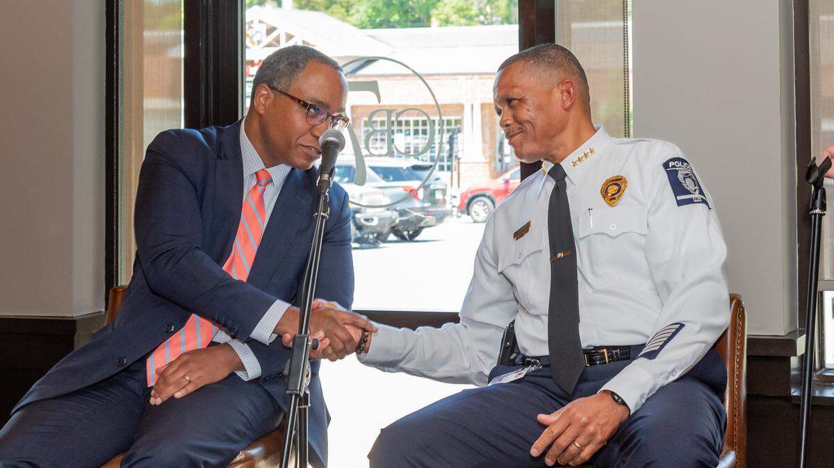 Mecklenburg District Attorney Spencer Merriweather, left, and Charlotte-Mecklenburg Police Chief Johnny Jennings called Wednesday for greater accountability in custody decisions regarding violent defendants. The pair spoke to the Hood Hargett Breakfast Club in Charlotte.
