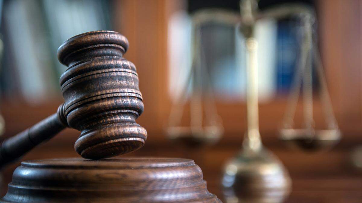Law and Justice concept. Mallet of the judge, books, scales of justice.