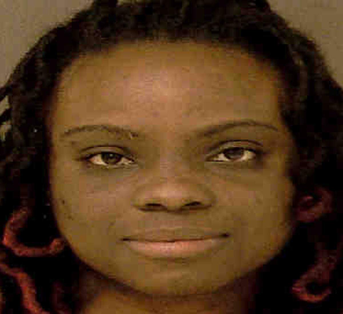 Precious Oliphant, was sentenced to 10 days in jail Thursday after she shouted a profanity in a federal courtroom.