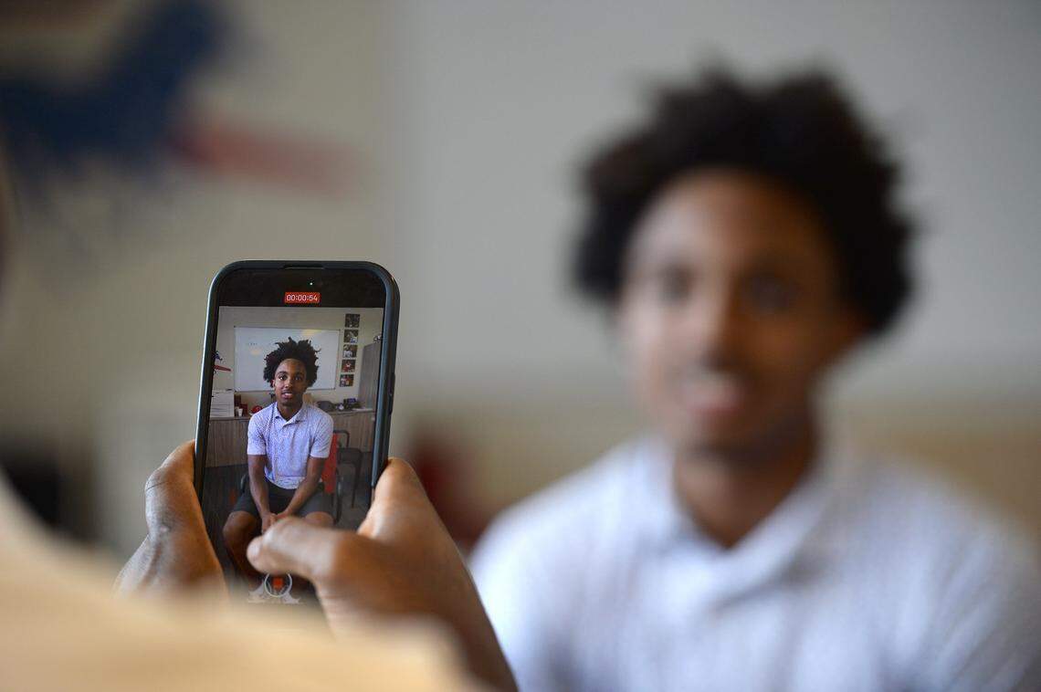 Former Washington Commanders star London Fletcher's son, Steele, 17, is a rising junior at Providence Day and a potential star. The Fletchers were rocked last year when Charne Fletcher, London's wife and Steele's mom died 7 days before her 50th birthday. They were buoyed by all the support received from the school community. Steele, who expects to play wide receiver and return punts and kick offs, got a tattoo of his mother in addition to a poem he wrote on his right leg. The Fletchers were photographed on Wednesday, August 20, 2025.