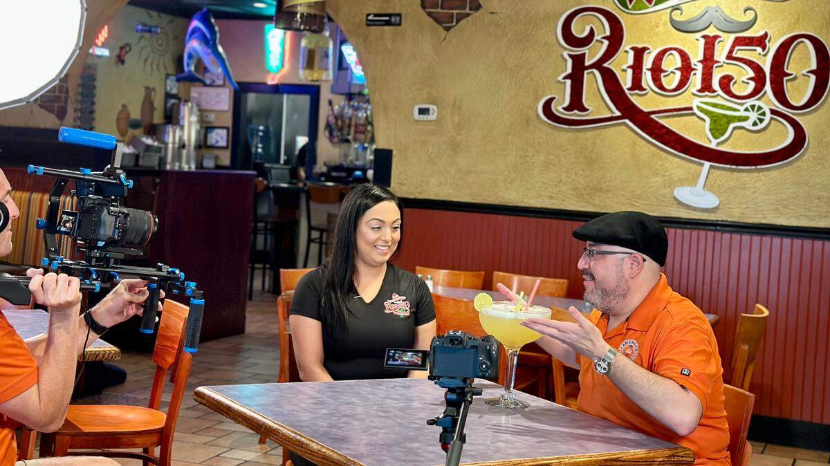 Rio 150 owner Rashel Limper with Luis Rivera, host of “America’s Best Restaurants”.