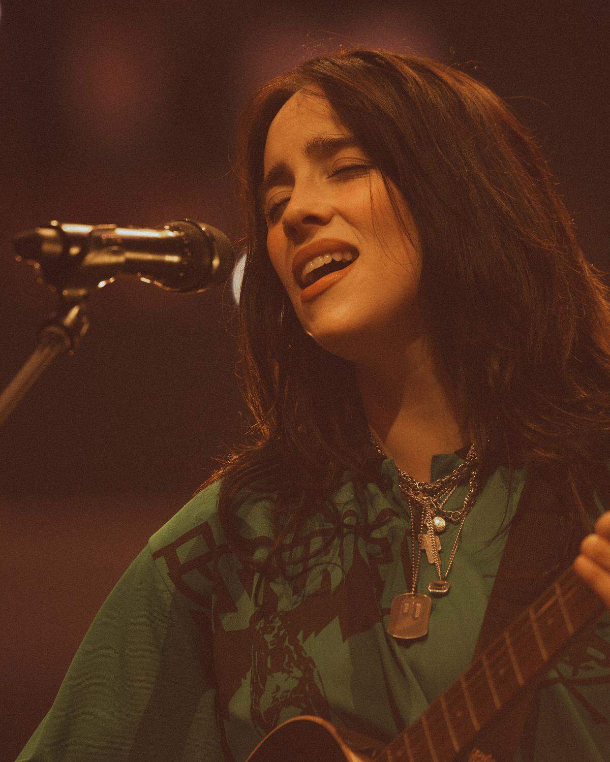 Billie Eilish performs an acoustic set at the Spectrum Center in uptown Charlotte during her “Hit Me Hard and Soft Tour” on Sunday, Oct. 19, 2025.