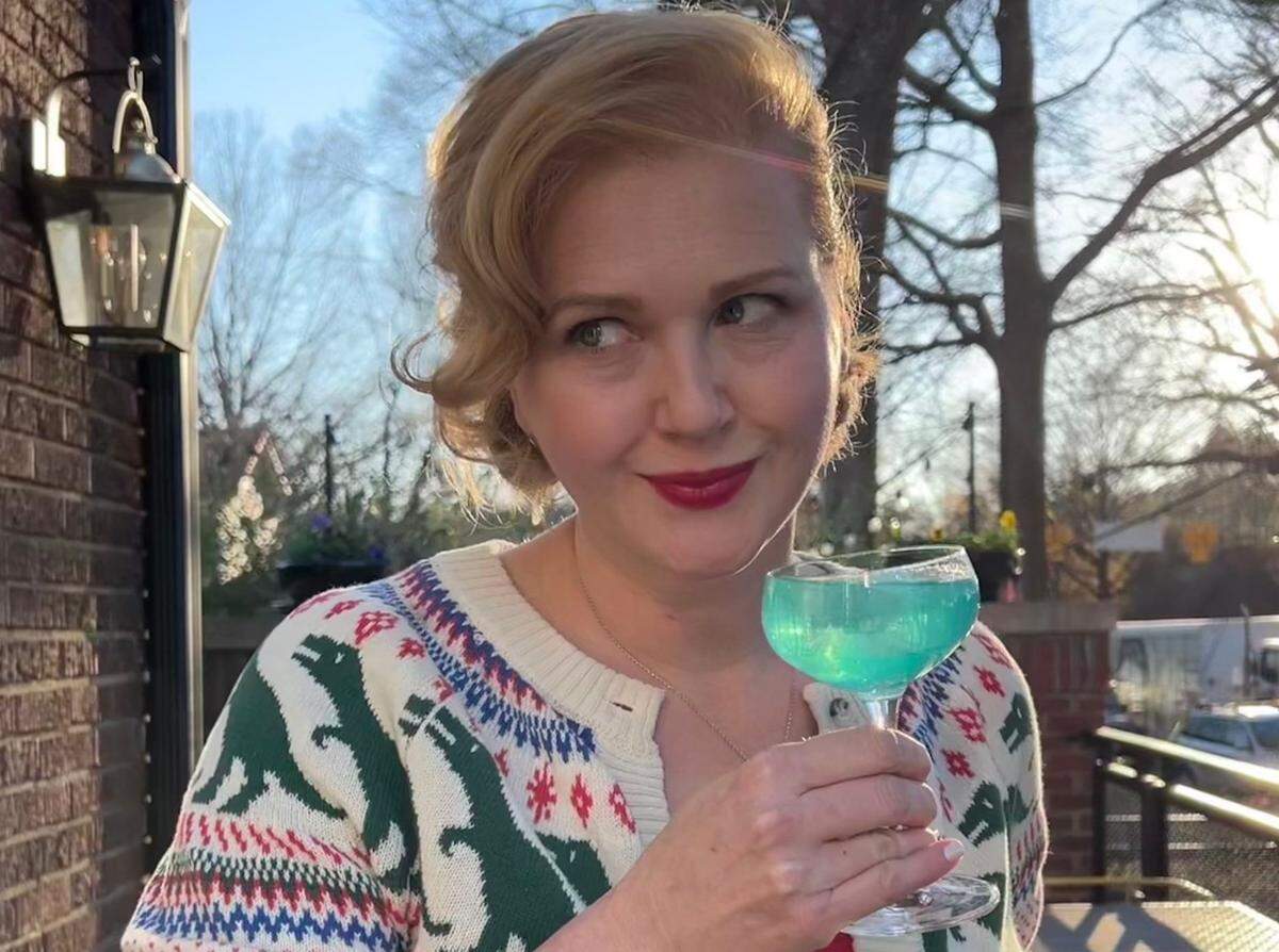 Supperland mixologist Colleen Hughes shows off her ugly sweater.