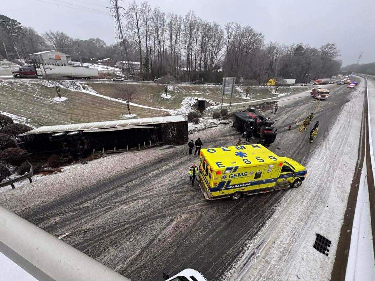 This image provided by the Gaston County Scanner Radio Facebook page shows an overturned tractor trailer on Interstate 85 in Gaston County near exit 20. That’s in northeast Gastonia and west of Charlotte.