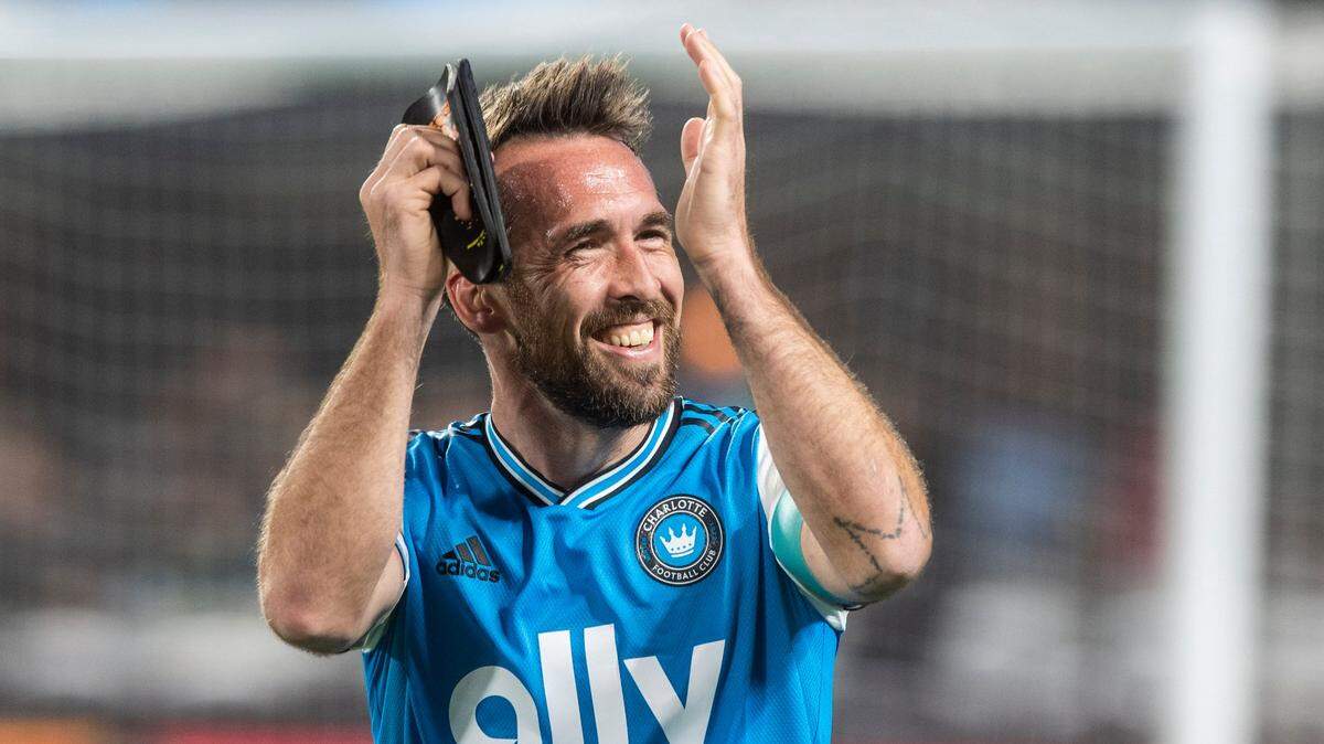 Charlotte FC Christian Fuchs celebrates after a win against the New England Revolution at Bank of America Stadium on Saturday, March 19, 2022 in Charlotte, NC. Charlotte FC defeated the Revolution, 3-1, for their first win of the season.