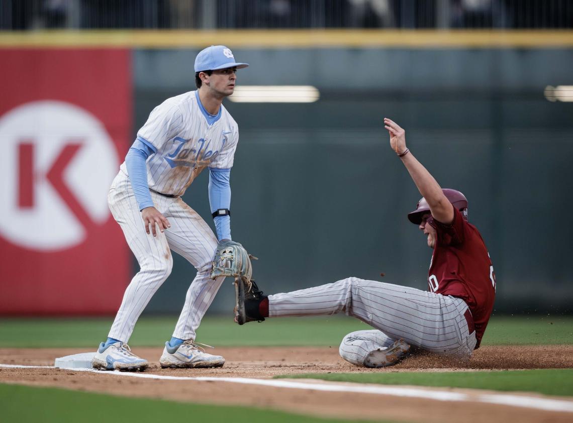 Gamecock outfield Ethan Petry (20) is safe at 3rd. North Carolina and South Carolina would play at Truist Field on April 9, 2024.