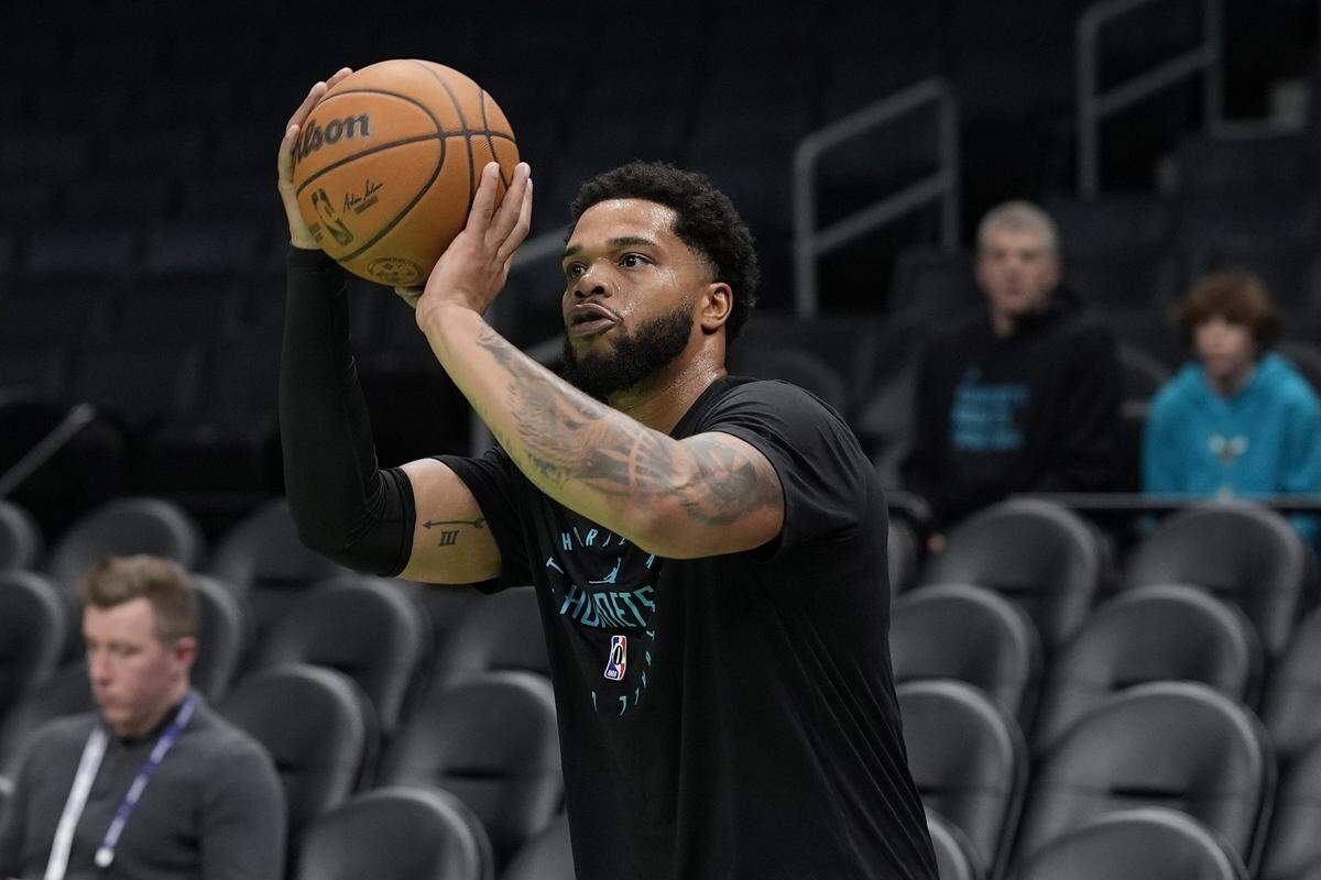 Charlotte Hornets forward Miles Bridges (0) during pregame warmups against the Milwaukee Bucks at Spectrum Center.