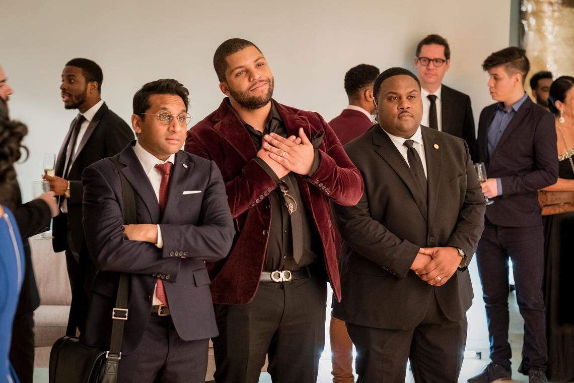 Ravi Patel (far left) appears in Long Shot, a romantic comedy featuring Charlize Theron and Seth Rogen. Patel is pictured here in a scene with O’shea Jackson Jr., (middle) and Tristan D. Lalla (right).