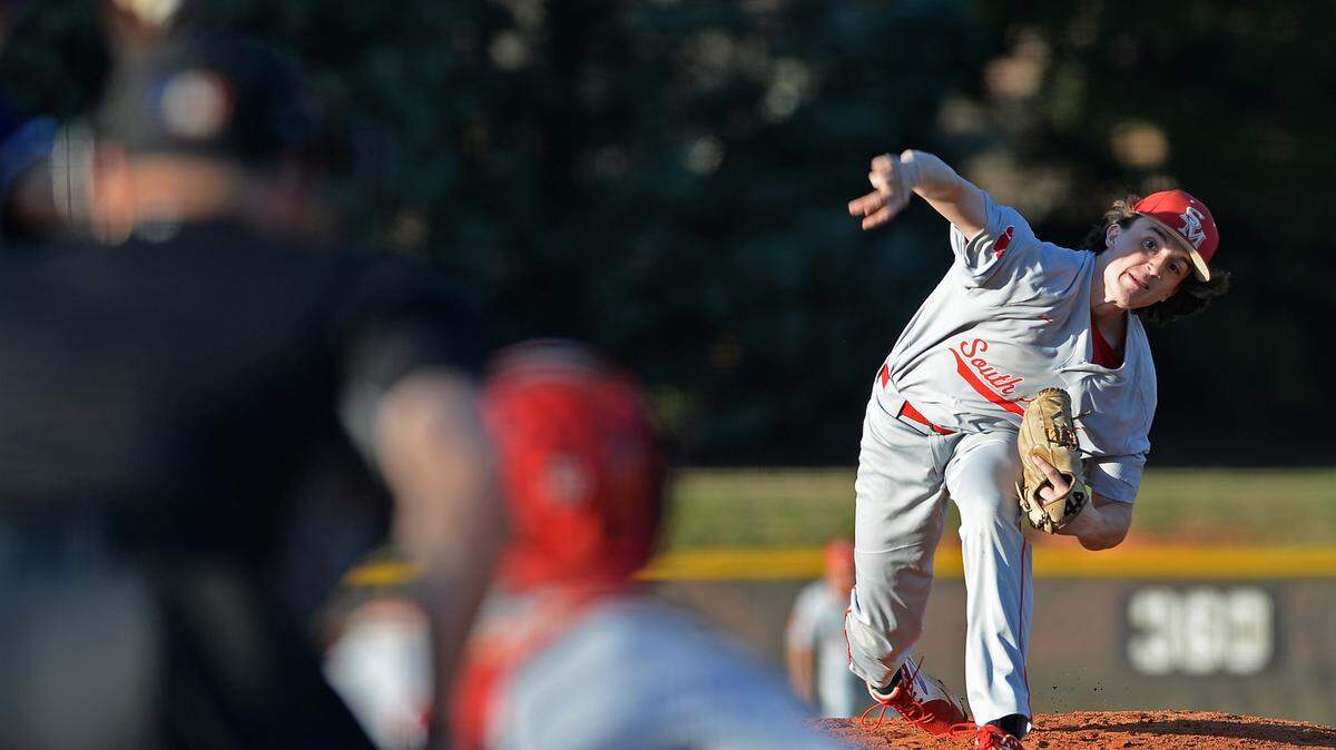 South Meck pitcher Ed Anglin delivers a pitch to an Ardrey Kell batter during prep baseball action on Friday, April 1, 2022 at Ardrey Kell High School.