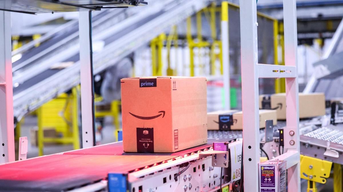 Each associate at Amazon’s fulfillment center in Charlotte has their own workstation where they scan and pack items ordered off Amazon’s website.