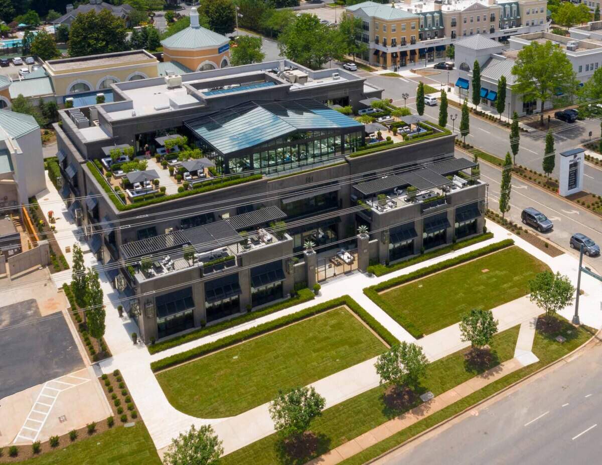 Phillips Place is just around the corner from SouthPark Mall, with dining and shopping including RH Rooftop, shown in foreground.