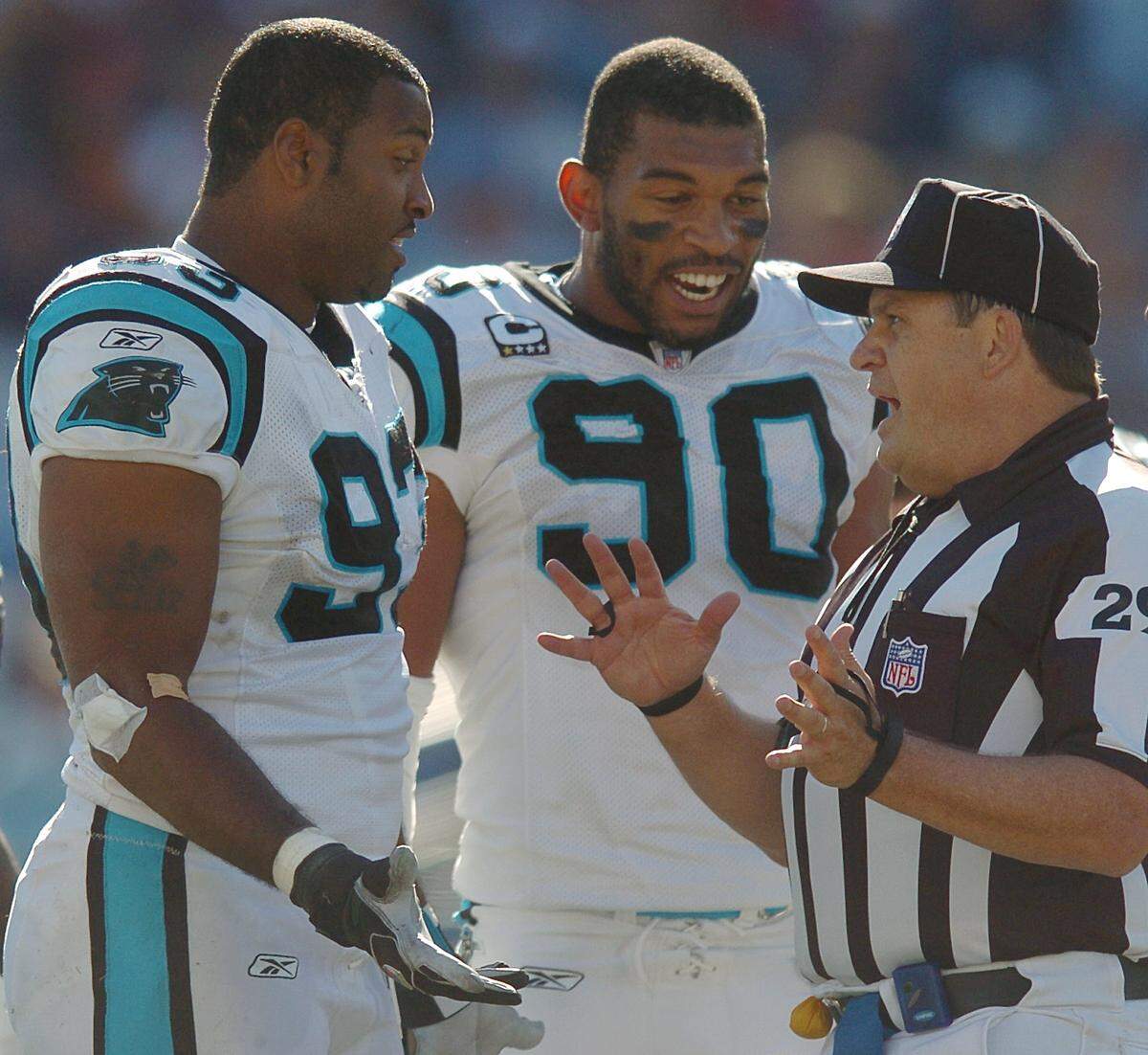 11/4/07 Carolina Panthers (93) defensive end Mike Rucker and (90) defensive end Julius Peppers talk with (29) umpire Steve Wilson following a call against Peppers vs the Tennessee Titans during second quarter action Sunday at LP Field in Nashville, TN. The Titans defeated the Panthers 20-7. JEFF SINER -- jsiner@charlotteobserver.com