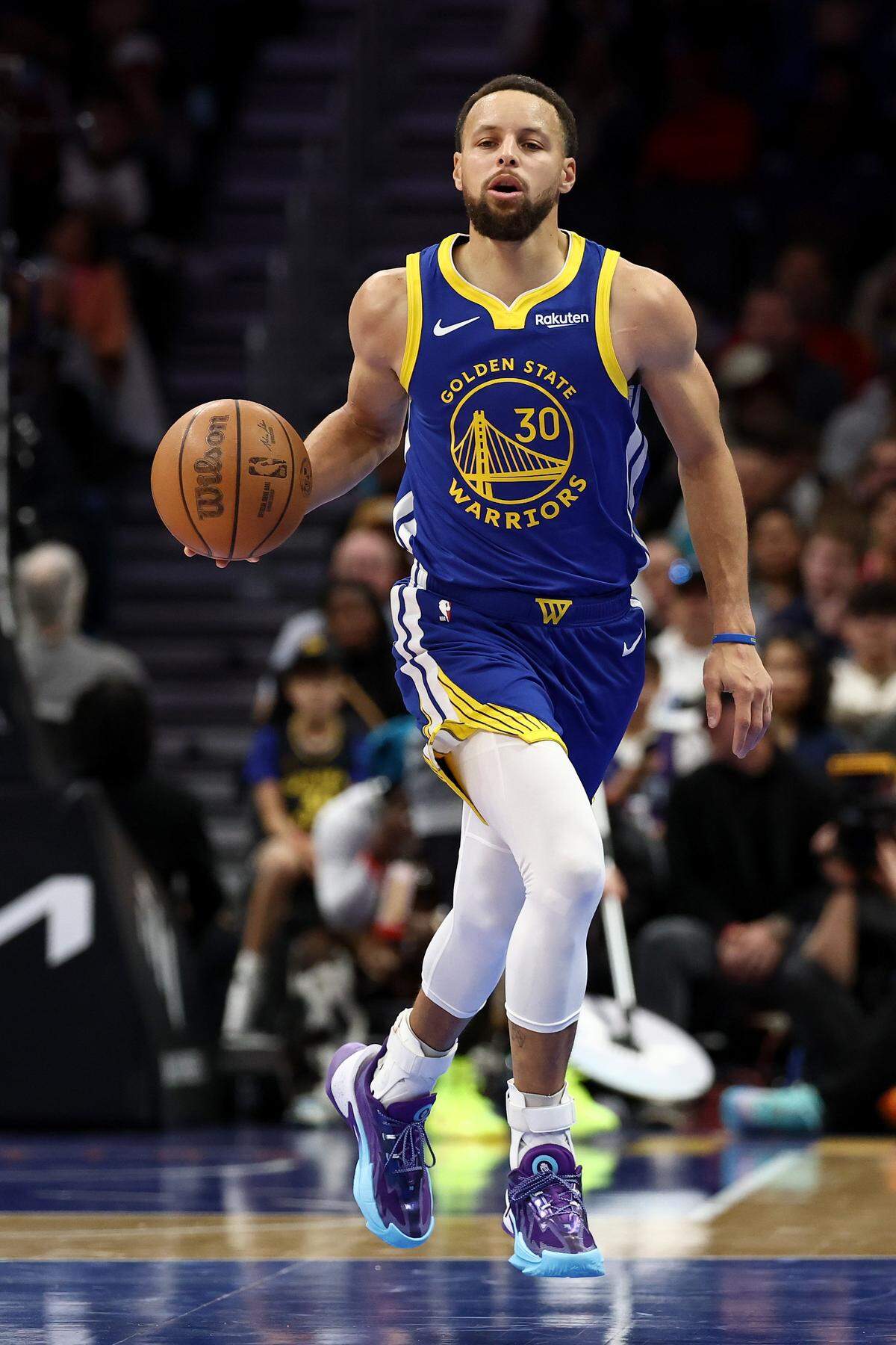 CHARLOTTE, NORTH CAROLINA - DECEMBER 31: Stephen Curry #30 of the Golden State Warriors brings the ball up court during the first half of the game against the Charlotte Hornets at Spectrum Center on December 31, 2025 in Charlotte, North Carolina. NOTE TO USER: User expressly acknowledges and agrees that, by downloading and or using this photograph, User is consenting to the terms and conditions of the Getty Images License Agreement. (Photo by Jared C. Tilton/Getty Images)