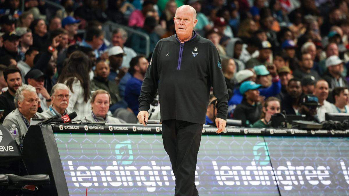 Hornets head coach Steve Clifford, center, watches from the sideline as his team plays the 76ers during the game at Spectrum Center on Friday, March 17, 2023.