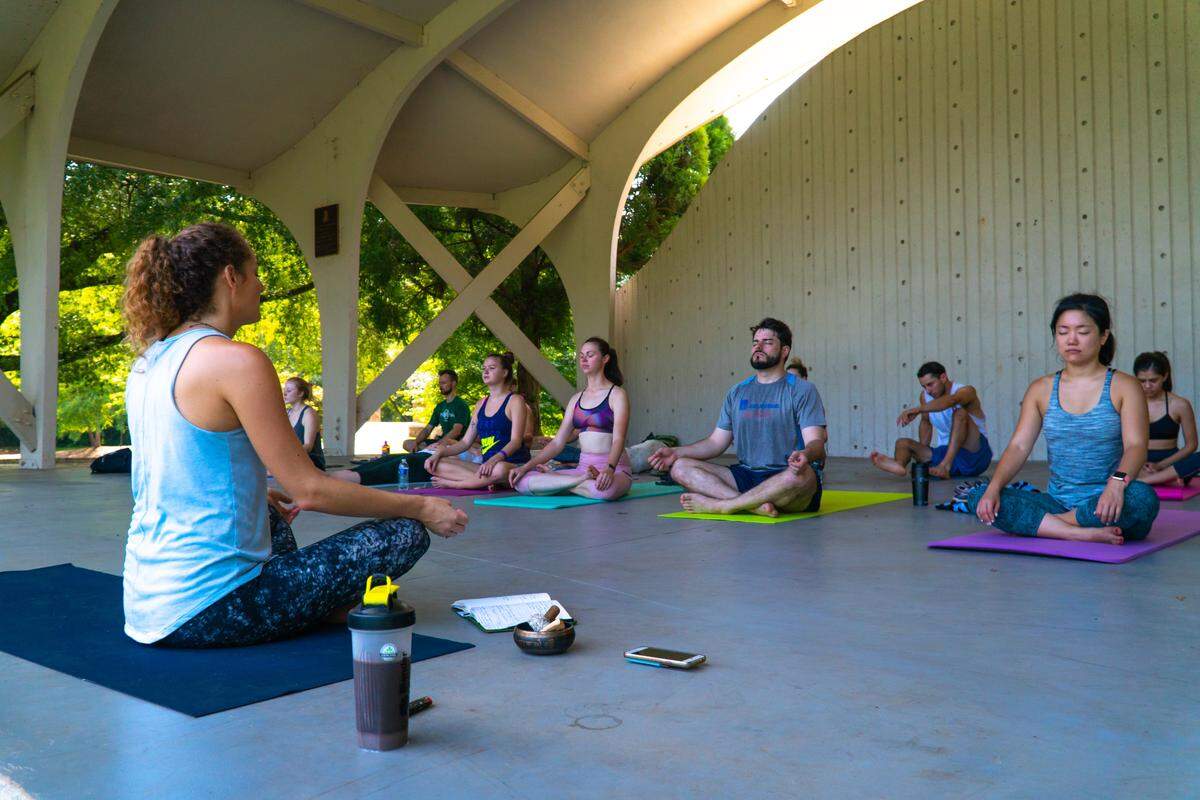 All fitness levels are welcome at the Habitual Roots yoga class in Freedom Park.