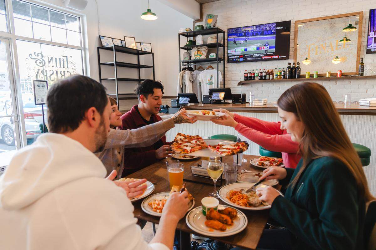 Finale Pizza serves 18” New York-style pizza made with shaved parmigiano reggiano