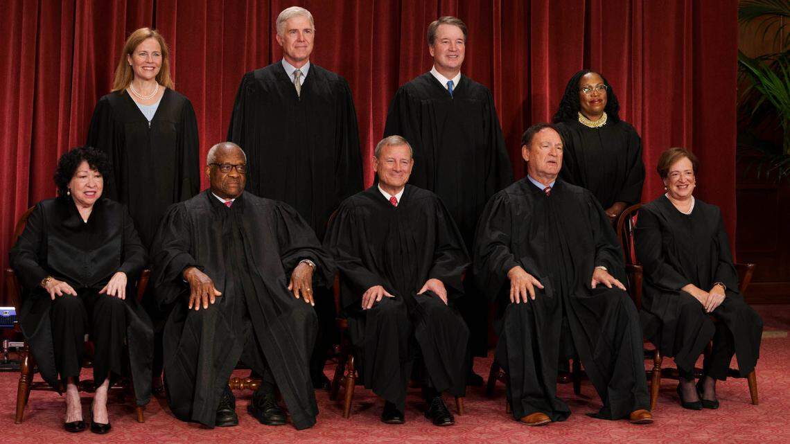 Members of the U.S. Supreme Court, seated from left: Associate Justices Sonia Sotomayor and Clarence Thomas, Chief Justice John Roberts and Associate Justices Samuel Alito and Elena Kagan. Standing, from left: Associate Justices Amy Coney Barrett, Neil Gorsuch, Brett Kavanaugh and Ketanji Brown Jackson.