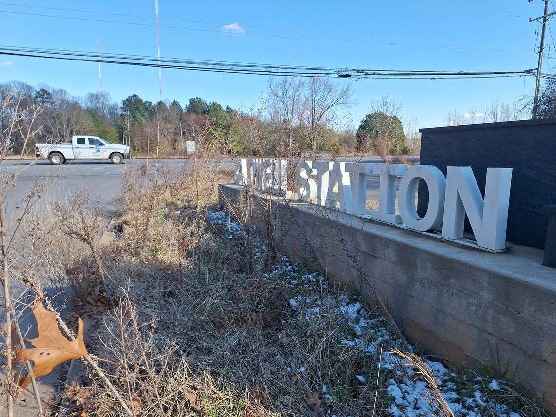 Weeds grow at the entrance to the Pointe at Caldwell Station apartments off N.C. 115 in Huntersville, NC, on Thursday, Feb. 20, 2025.