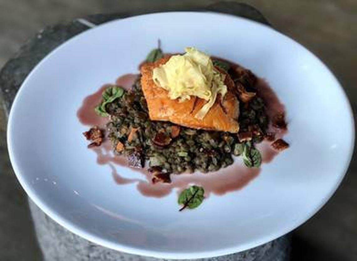 The Sixty South Salmon at 5Church is served over lentils with lardons, a beurre rouge sauce and topped with melted Dijon fennel.&nbsp;