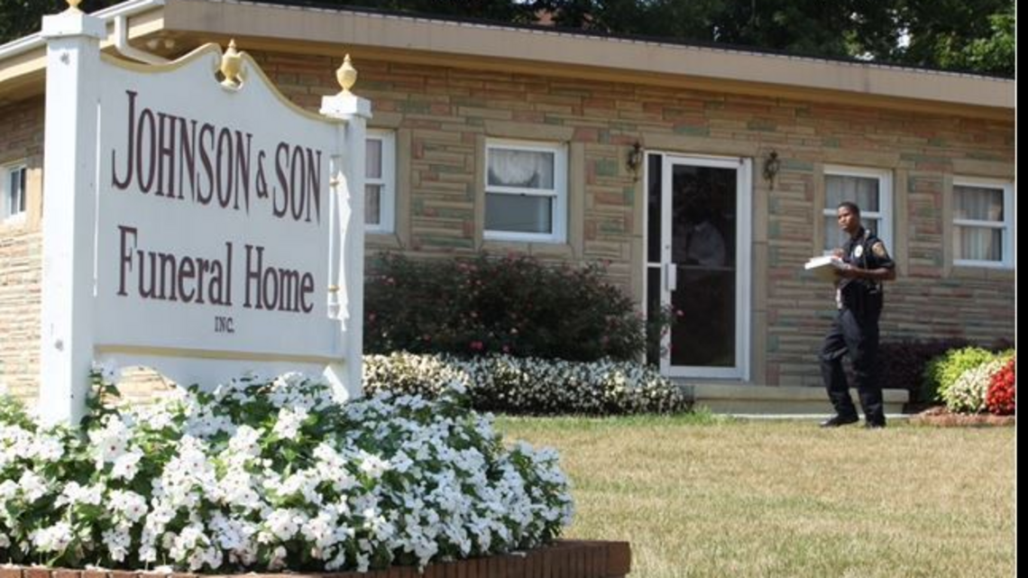 Father and son fought at their family funeral home. Both had guns, but