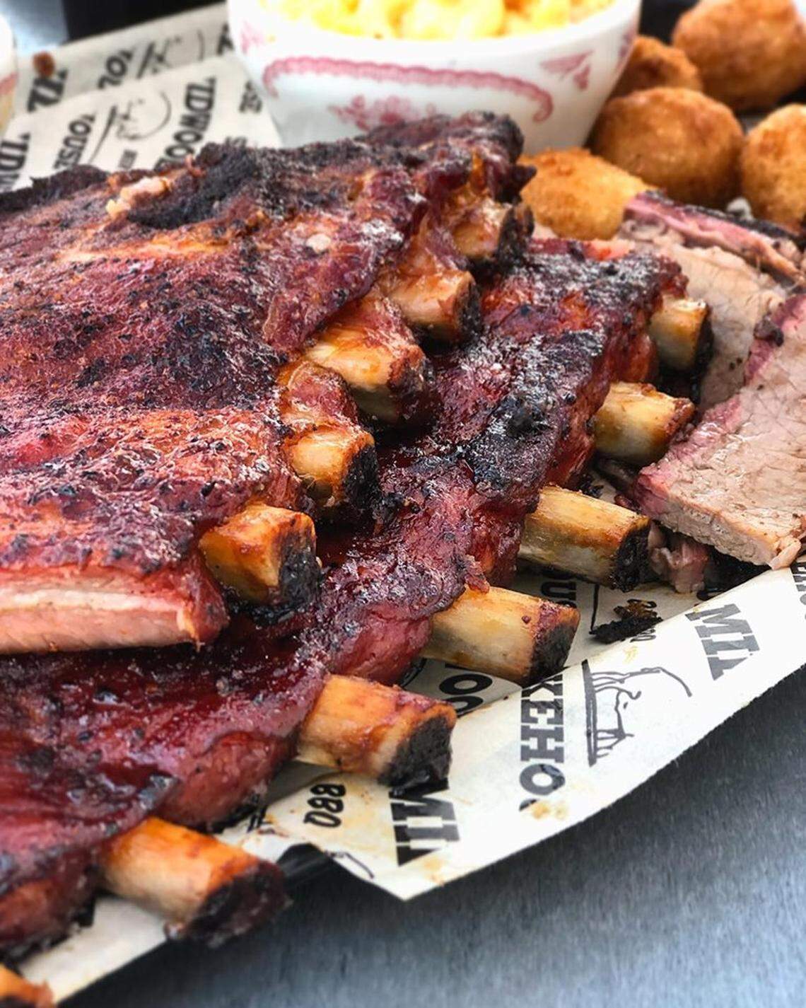 The Saint Louis Style Pork Ribs are served dry or sauced — your choice.