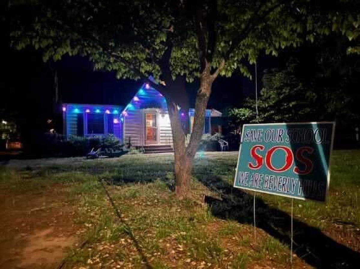 A “Save Our School” yard sign sits outside a home in Concord. Courtesy of Lee Shuman.