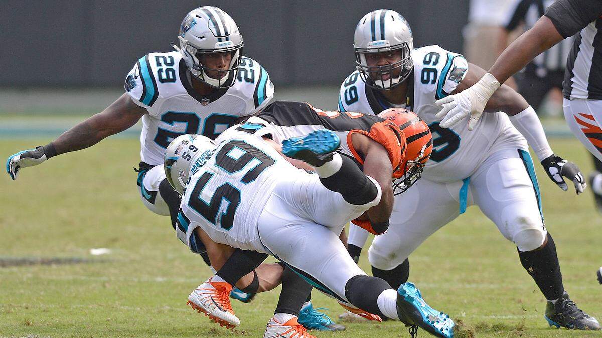 Carolina Panthers safety Mike Adams (29) has to support linebacker Luke Kuechly (59) in the run game and also be aware in the pass defense on Sunday against the New York Giants. And help new teammate Eric Reid, too.