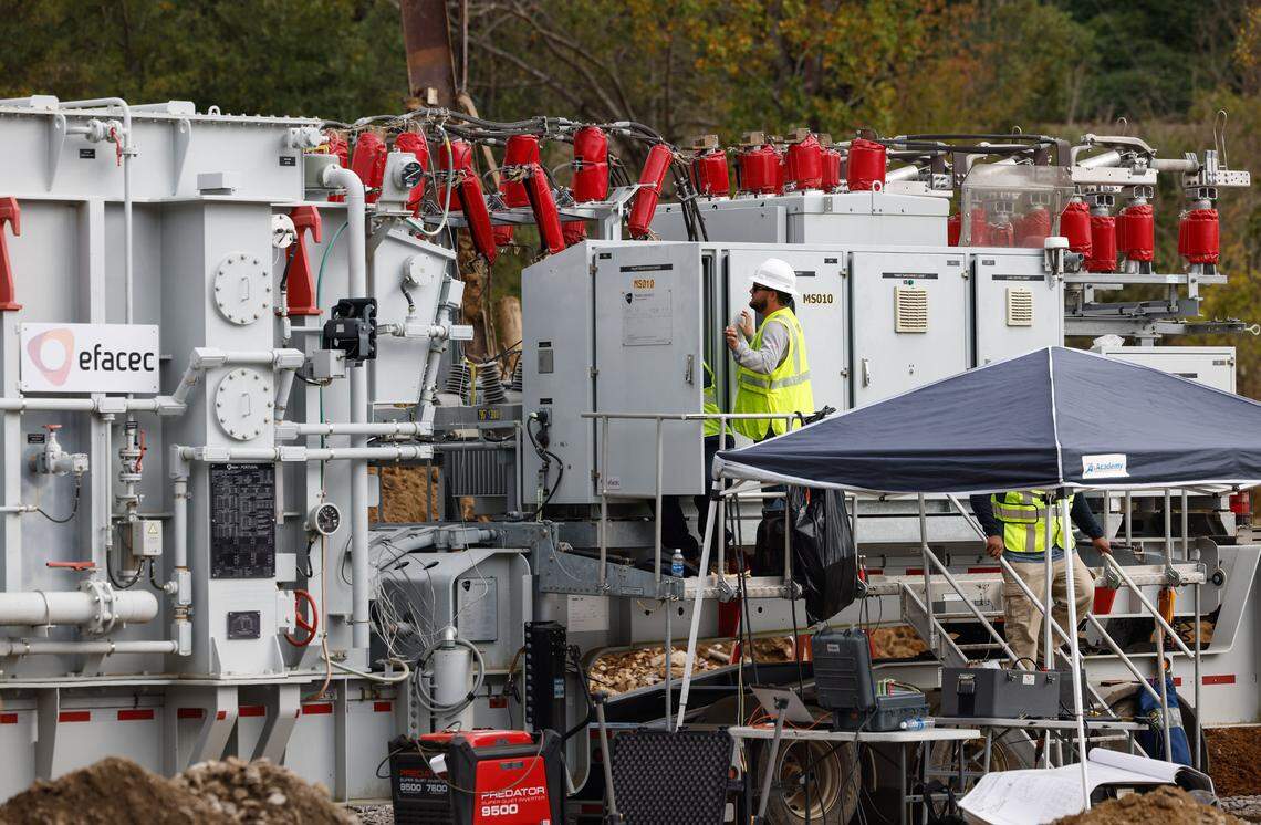 Duke Energy works to install a mobile substation on Swannanoa Drive, near Biltmore Village, in Asheville on Thursday, Oct. 3, 2024.