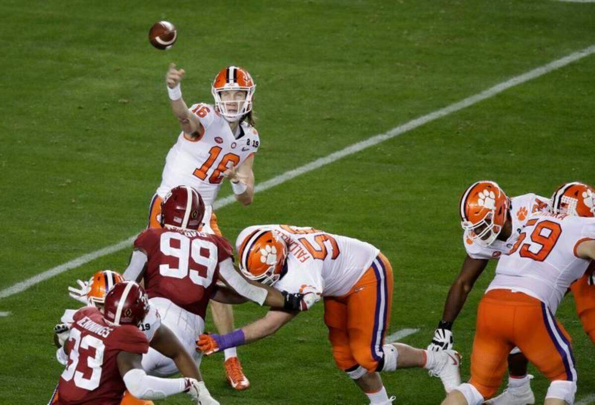 Clemson’s Trevor Lawrence throws during the first half of the NCAA college football playoff championship game against Alabama, Monday, Jan. 7, 2019, in Santa Clara, Calif.