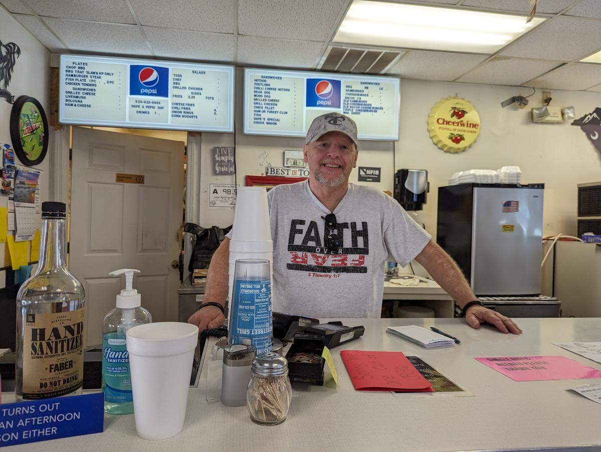 Eddie Hollar, owner of Hollar’s Backstreet Grill in Taylorsville, stands behind the counter during lunchtime on Friday, Sept. 1. He said he has many customers and friends who worked at Mitchell Gold + Bob Williams furniture company, which closed Aug. 25.