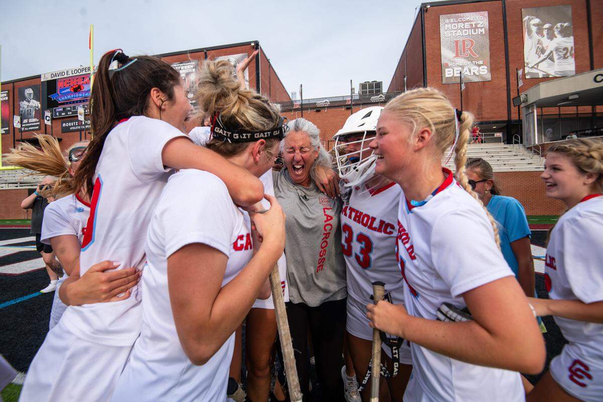 Charlotte Catholic players celebrate winning the 1-6A NCHSAA girls lacrosse finals, 9-8, after sudden death overtime against East Chapel Hill at Lenoir-Rhyne University in Hickory, NC on Friday, May 29, 2026.