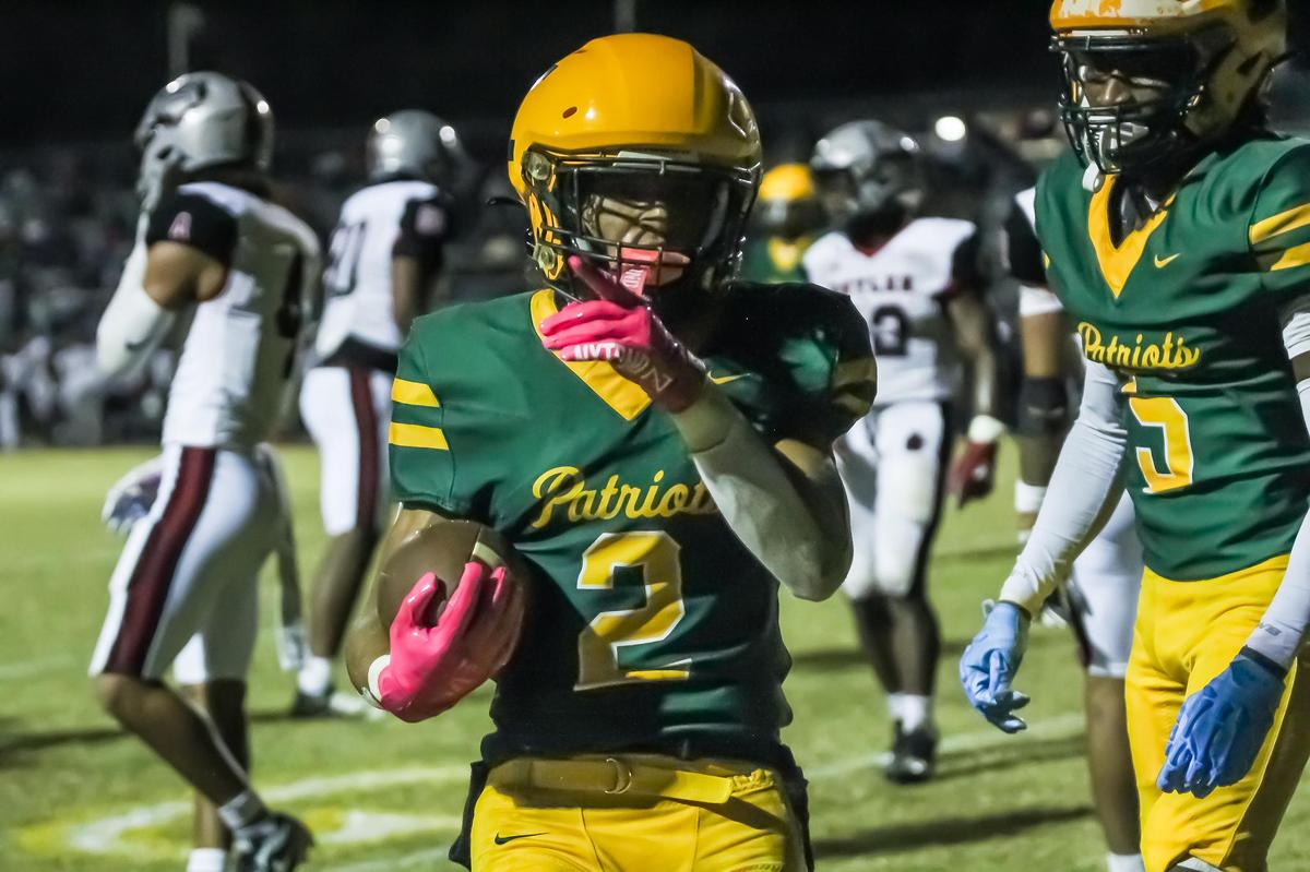 Jayden Jones celebrates his touchdown against rival Butler during the Butler-Independence game Friday, Nov. 1 at Independence High in Mint Hill, N.C.