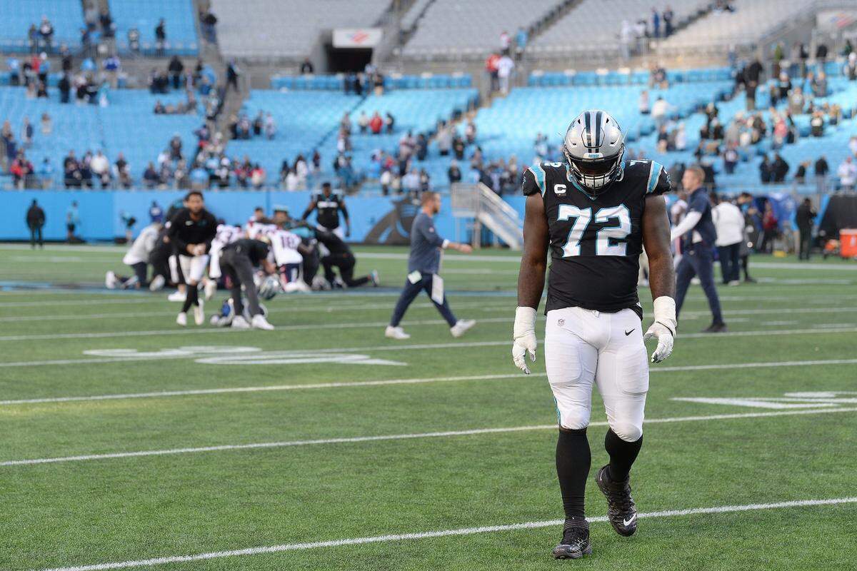 Carolina Panthers tackle Taylor Moton walks off the field following the team’s 24-6 loss to the New England Patriots at Bank of America Stadium in Charlotte, NC on Sunday, November 7, 2021.