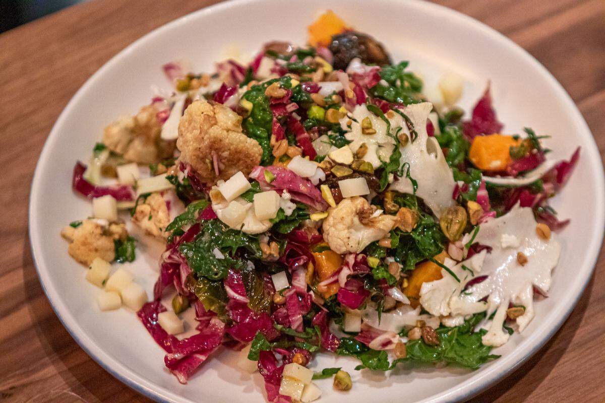 Seasonal Vegetable Salad from North Italia: Butternut squash, brussels sprouts, cauliflower, kale, radicchio, pecorino, farro, pistachio, dates, white balsamic vinaigrette.