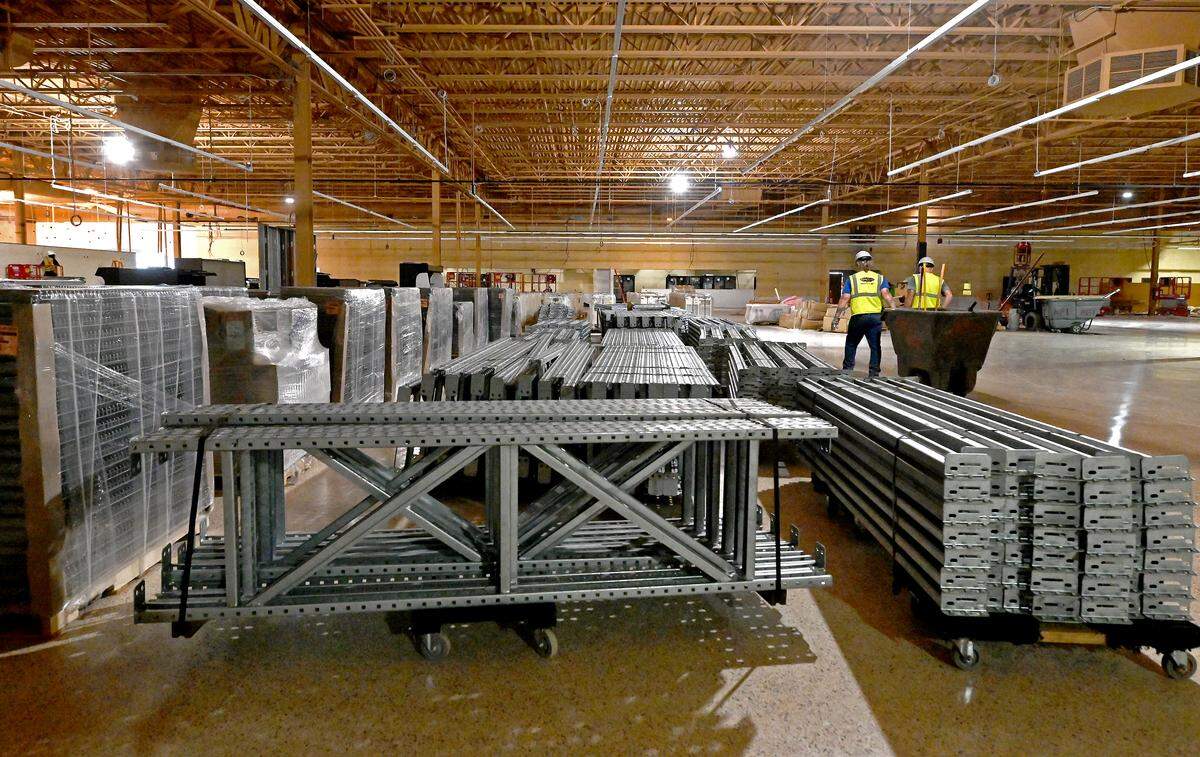 Shelving waits to be placed inside the Wegmans store on Thursday, May 21, 2026 at 11550 N. Community House Road in Charlotte.