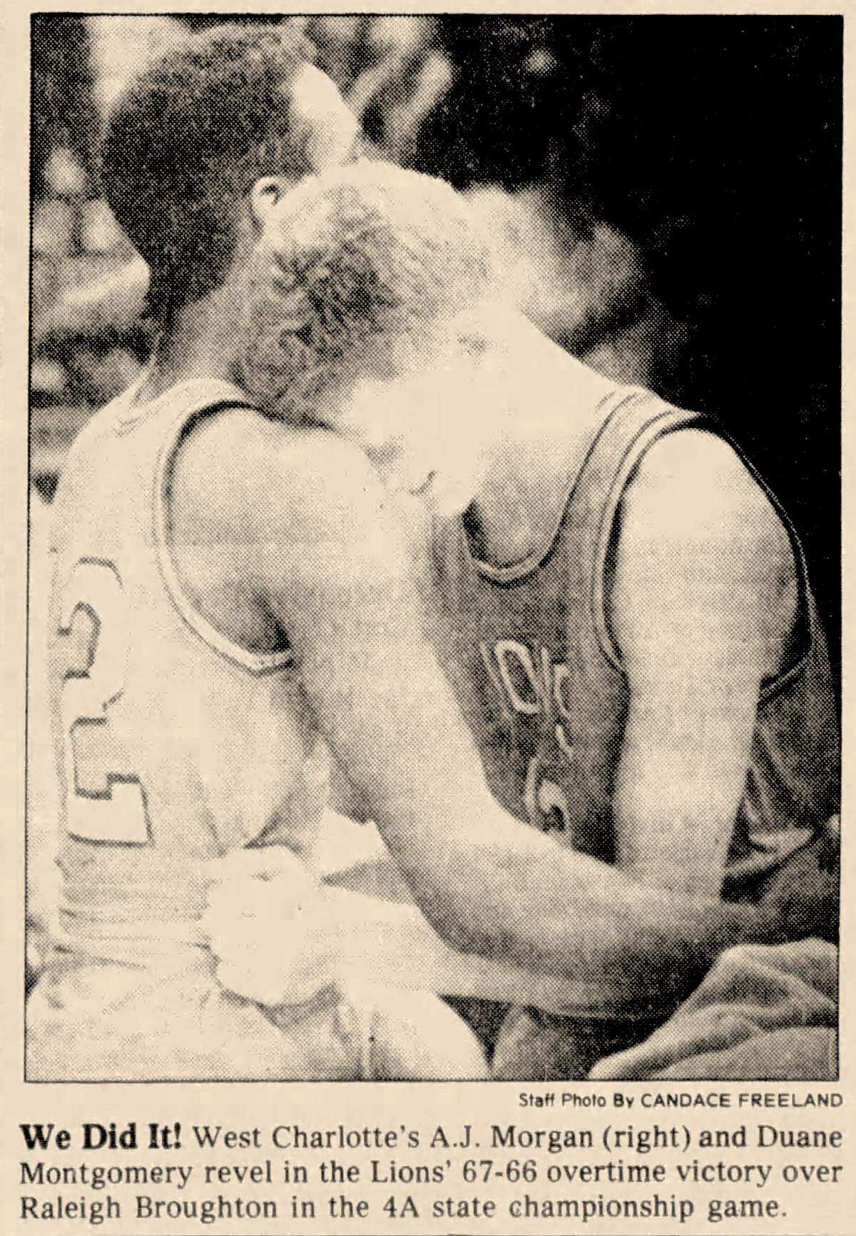 After the 1986 state championship game, West Charlotte’s Duane Montgomery (left) and AJ Morgan embraced