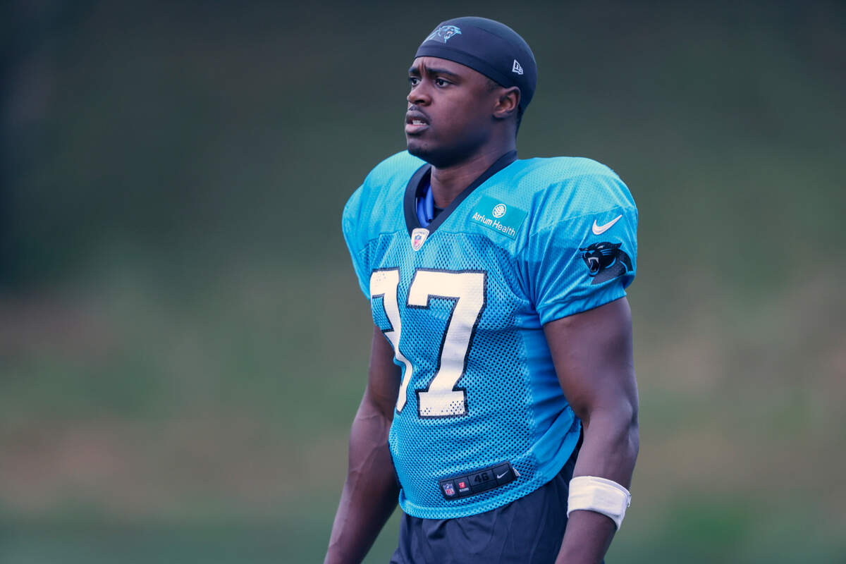 Carolina Panthers defensive back J.T. Ibe walks onto the practice field at the NFL football team’s training camp in Spartanburg, S.C., Tuesday, Aug. 3, 2021. Carolina Panthers wide receiver Keith Kirkwood was hit in the neck area during practice Tuesday, carted off the field and taken away in an ambulance. Defensive back J.T. Ibe delivered the hit on a pass play and was immediately kicked out of the team’s first padded practice by coach Matt Rhule. (AP Photo/Nell Redmond)