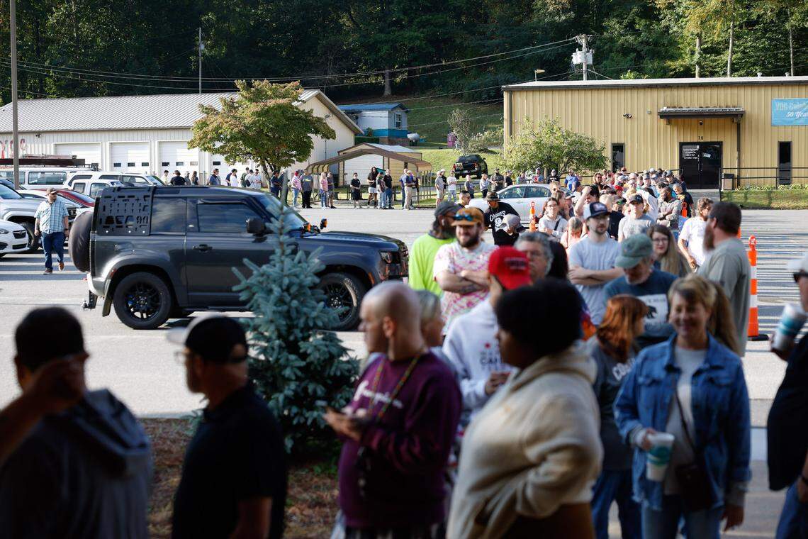 A long line of people wait in line for the 10:00 a.m. opening of the Great Smokies Cannabis Company dispensary in Cherokee, NC on Saturday, September 7, 2024.