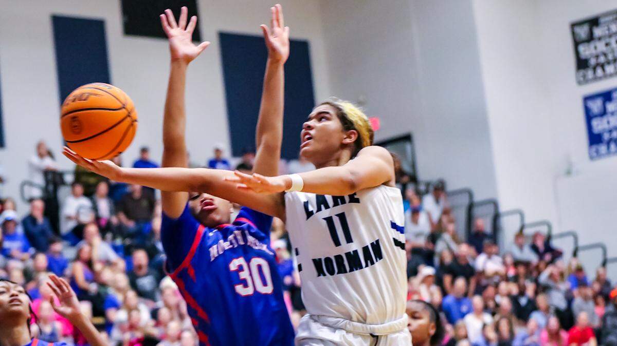 Lake Norman drives to the basket for two