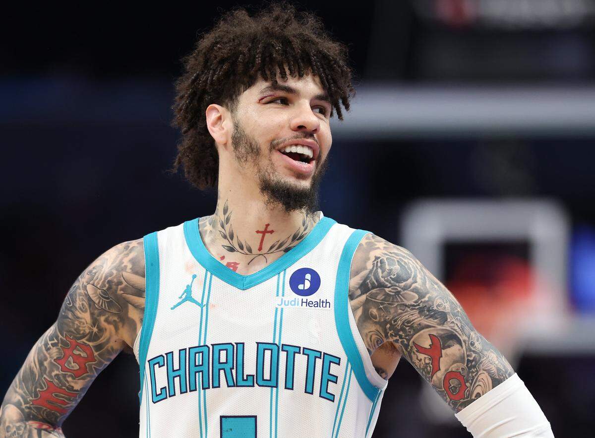 Charlotte Hornets guard LaMelo Ball is able to still laugh after sustaining a cut above his right eye following a collision with head coach Charles Lee during first quarter action against the New Orleans Pelicans at Spectrum Center in Charlotte, NC on Monday, February 2, 2026. The Hornets defeated the Pelicans 102-95.