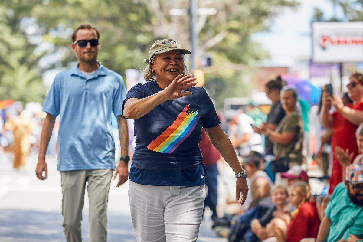 Mayor Vi Lyles walks the parade route and interacts with the crowd at the beginning of the 25th Charlotte Pride Parade in uptown Charlotte on August 17, 2025.